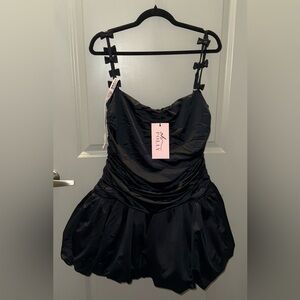 CIRILLA
Bow-Detail Ruched Bubble Hem Mini Dress in Black